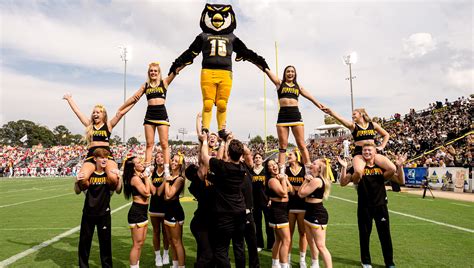 Ksu Owls Cheerleading Team Spirit And Excellence